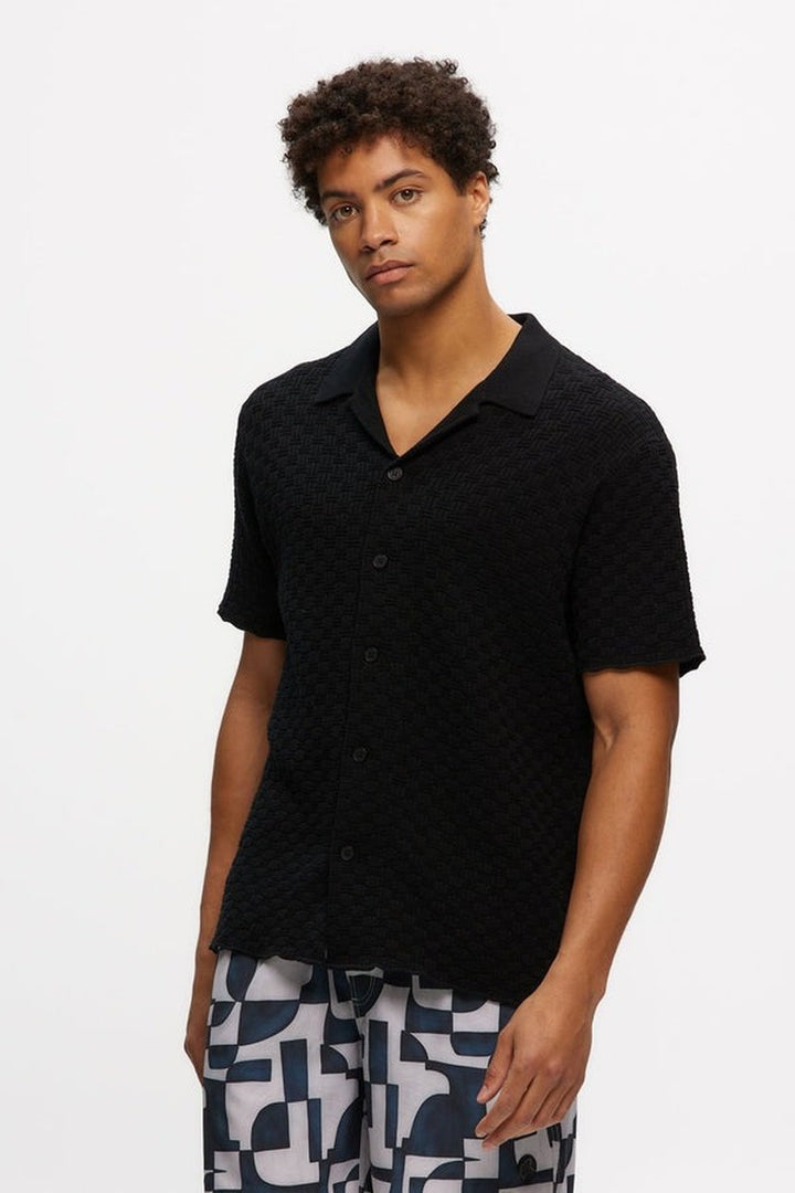 Kuwalla Tee - Knitted Yacht Shirt in Black