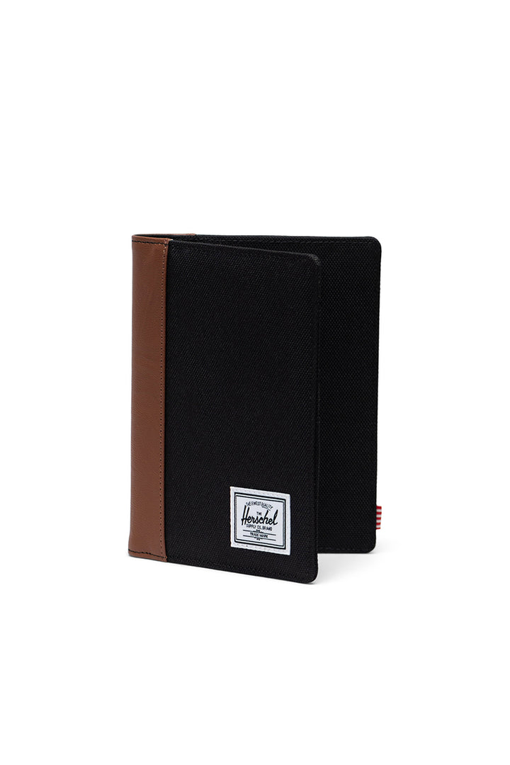 Herschel - Raynor Passport Holder in Black/Tan